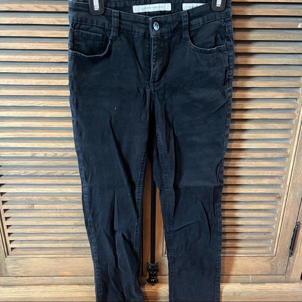 Black skinny jeans with slight flare at ankle very flattering